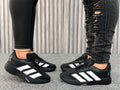 Tenis deportivos de líneas negro para hombre