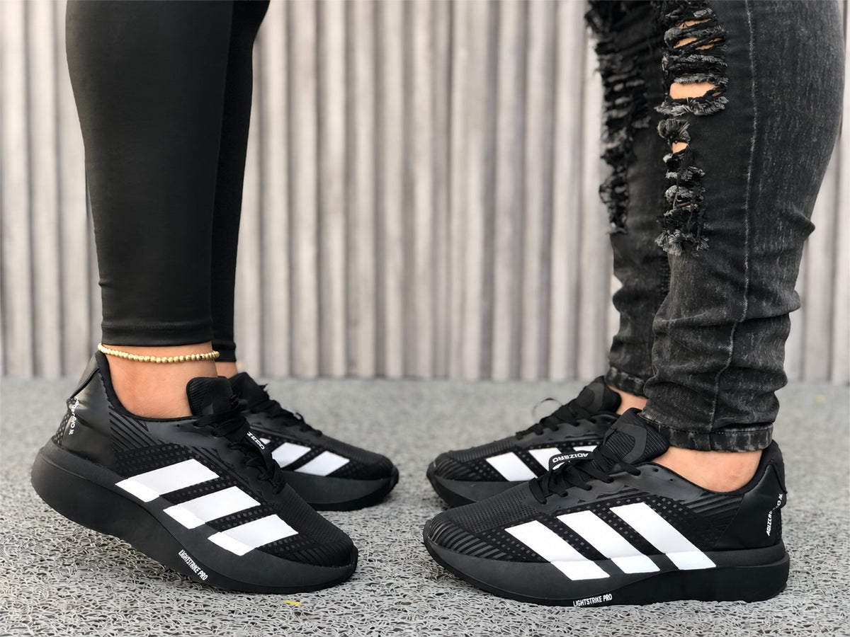 Tenis deportivos de líneas negro para hombre