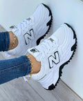 Tenis clásicos de paneles blanco negro para hombre